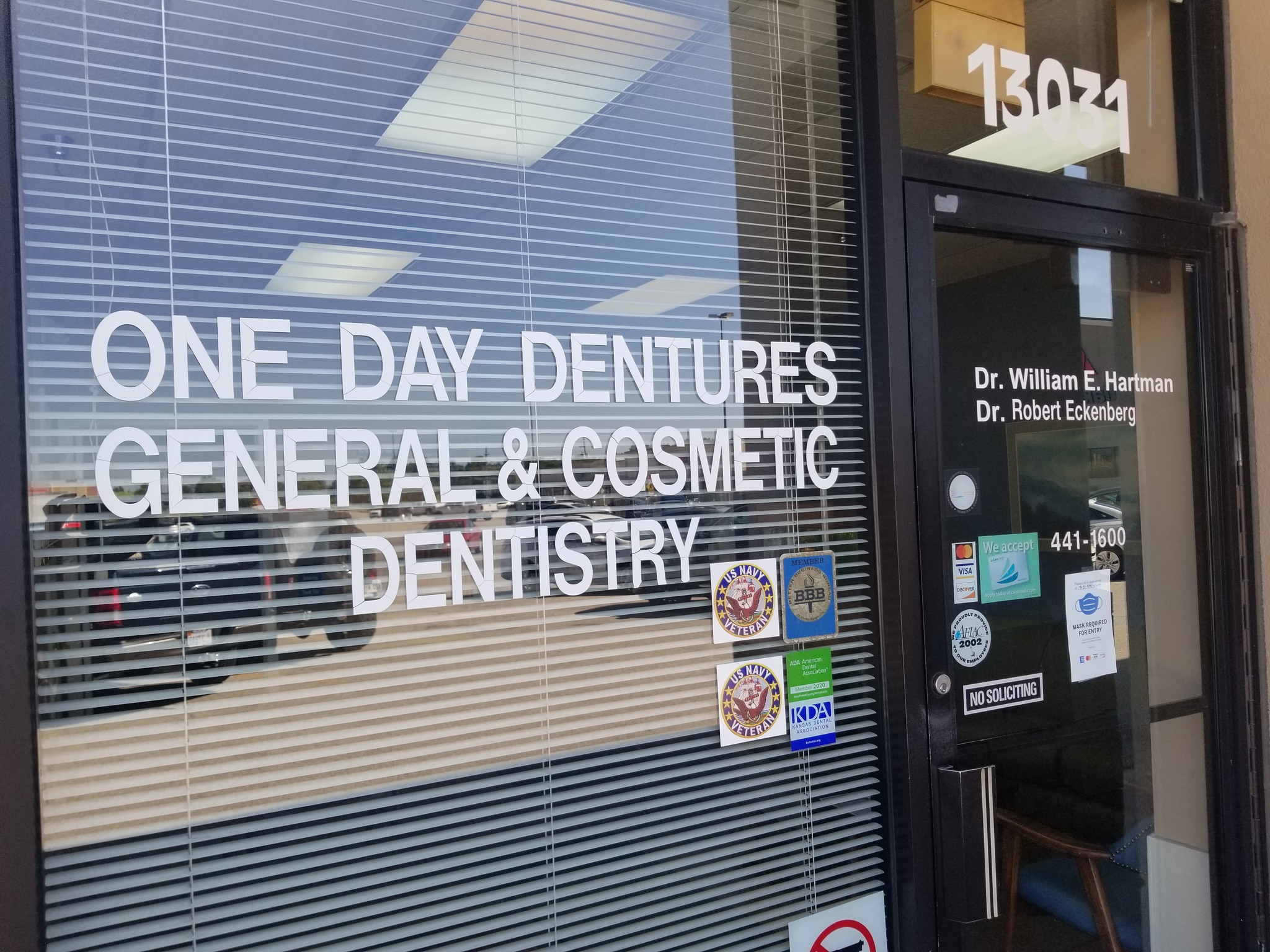 Dr. Hartman Dentistry office door — One Day Dentures, General & Cosmetic Dentistry